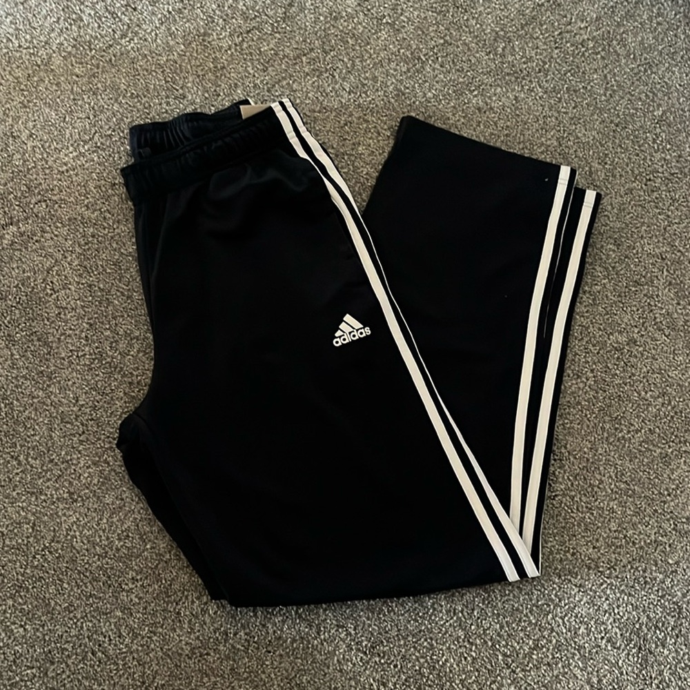 Brand new Adidas Men’s multi sport pants size medium regular length
